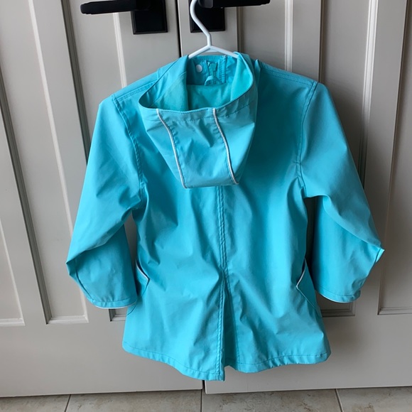 Girls turquoise raincoat - size 6X - Picture 2 of 4